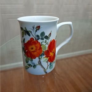 - Brand New Beutiful Multicolor Floral Stechcol Mug .
